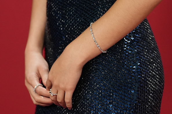 Olivia Rodrigo attended the 2025 GQ Men’s Year Awards wearing Shay Jewelry’s mixed diamond tennis bracelet, diamond marquise wave ring, and diamond back-to-basic eternity band.
