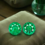 two round emeralds