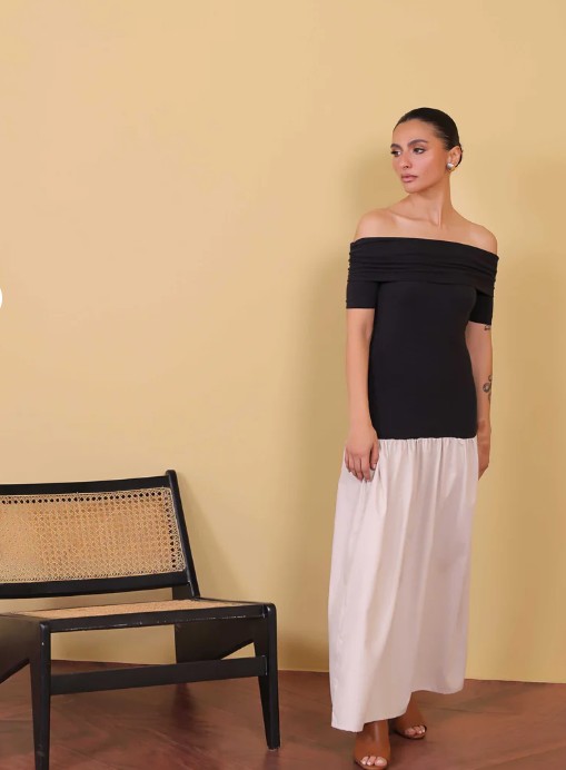 women's western wear in Pakistan model in black off the shoulder top and white midi skirt