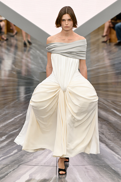 Model wearing custom dior on the runway