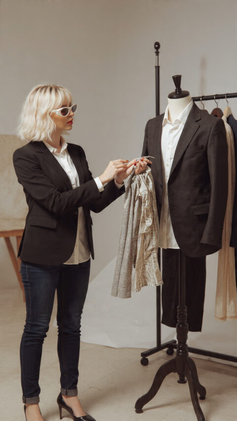 fashion stylist working on clothes