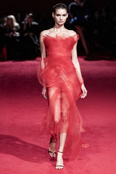 model wearing  a Christian Siriano Scarlet Red Horsehair 