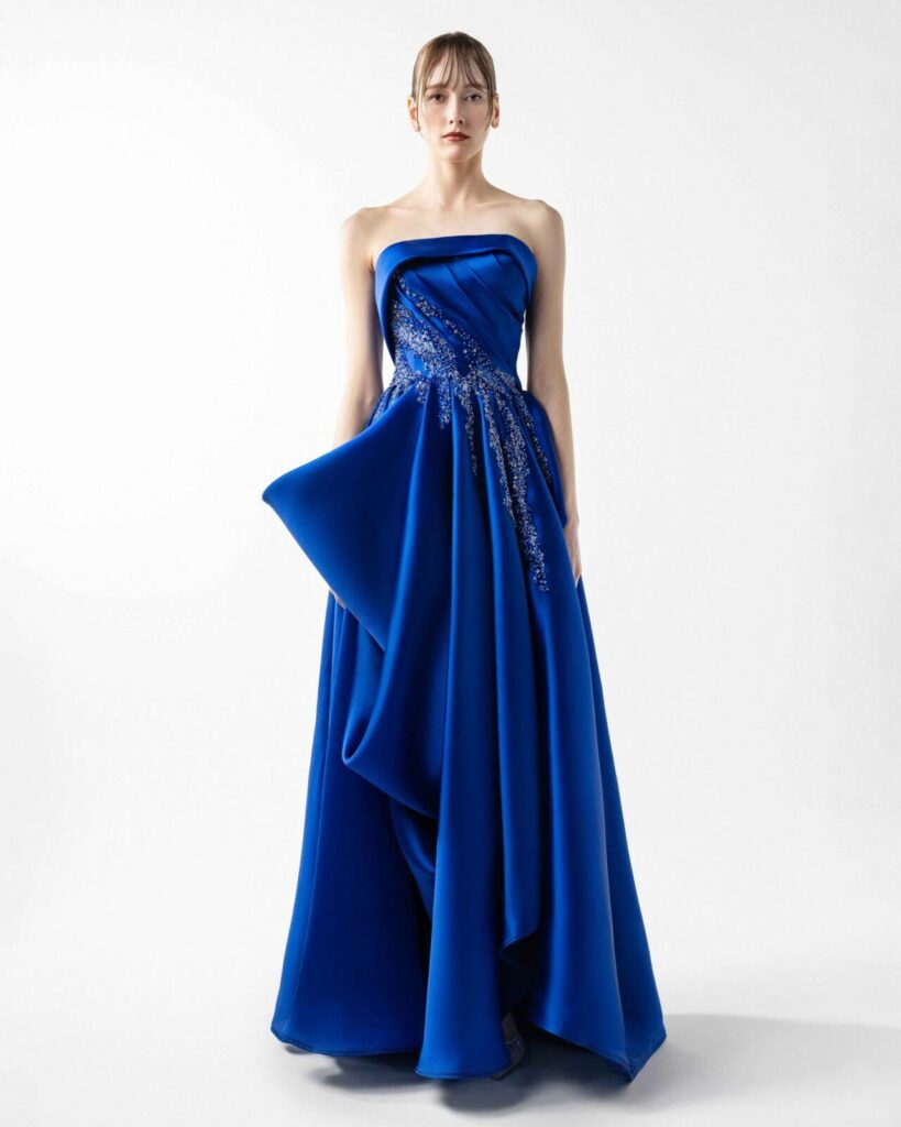 The Gaby Charbachy Fall/Winter 2026 strapless, sculptural evening dress in a rich, royal sapphire blu