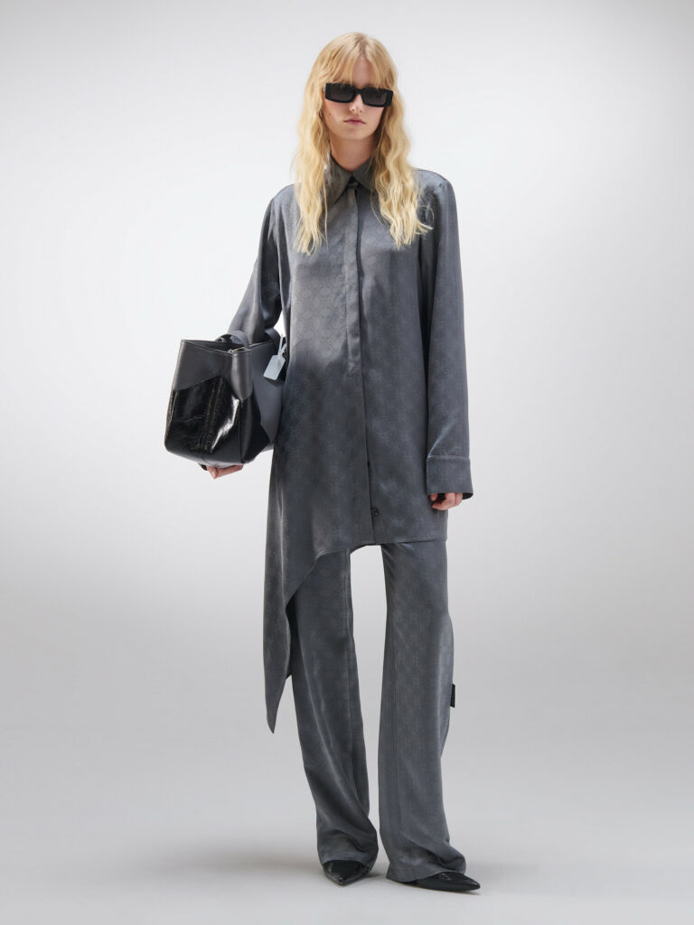 Model wearing Off White Long gray shirt with Gray Pants