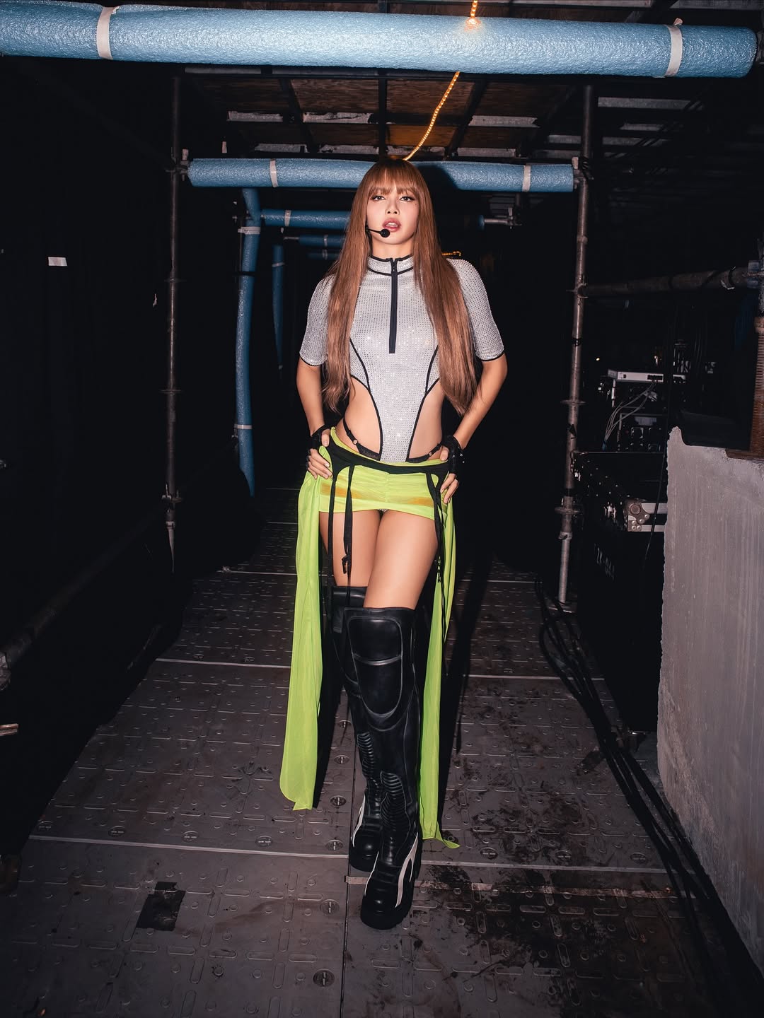 Blackpink Lisa at the Blackpink Deadline World Tour concert in a Fancì Club cutout bodysuit and sheer skirt set.