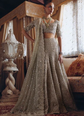 Model wearing crop top Pakistani bridal dresses at SAIRA SHAKIRA