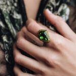 woman wearing a Tsavorite garnet ring