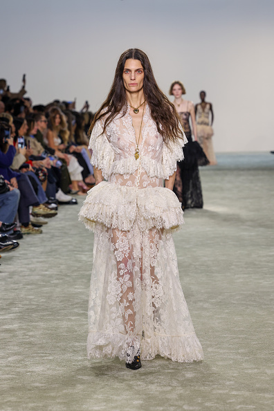 Dakota Johnson at the 2025 Red Sea International Film Festival in a bespoke black cutout dress by Alessandra Rich